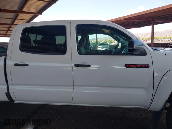 2015 Toyota Tacoma with VIN 3TMMU4FN0FM084956, listed as a IAAI auction lot 42184249 with 116,576 mi miles and . Bid and sale history available at DreamBid. Image 14.