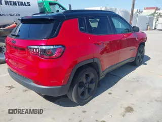 2021 Jeep Compass Altitude with VIN 3C4NJCBB3MT560039, listed as a IAAI auction lot 42536979 with 30,357 mi miles and . Bid and sale history available at DreamBid. Image 4.