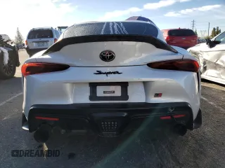 2020 Toyota Supra 3.0 z VIN WZ1DB4C06LW028984, wystawiony jako Copart lot #82659403 z przebiegiem 38 776 mil mil oraz . Historia ofert i sprzedaży dostępna na DreamBid. Obrazek 6.