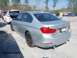 2014 BMW 3 Series 335i xDrive with VIN WBA3B9G52ENR91044, listed as a IAAI auction lot 41807408 with 200,000 mi miles and . Bid and sale history available at carsss.com. Image 3.