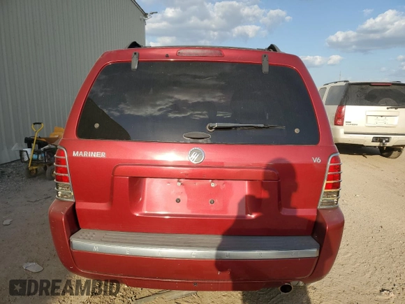 2005 Mercury Mariner Luxury z VIN 4M2YU56175DJ33563, wystawiony jako Copart lot #73497134 z przebiegiem 152 513 mil mil oraz Szkody całkowita. Historia ofert i sprzedaży dostępna na DreamBid. Obrazek 6.