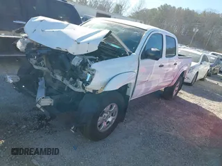 2014 Toyota Tacoma with VIN 5TFLU4EN1EX103052, listed as a IAAI auction lot 41653270 with 121,656 mi miles. Bid and sale history available at carsss.com. Image 17.
