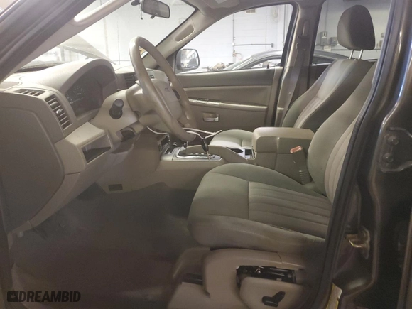 2006 Jeep Grand Cherokee Laredo with VIN 1J4GS48K26C285341, listed as a Copart auction lot 59287334 with 218,787 mi miles and Salvage Title. Bid and sale history available at carsss.com. Image 7.
