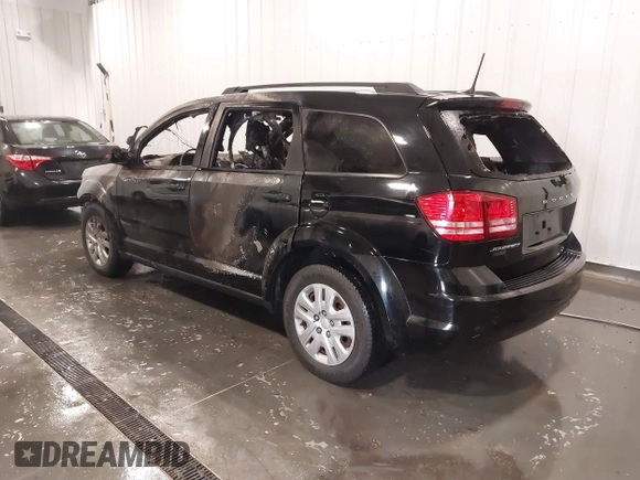 2018 Dodge Journey SE with VIN 3C4PDCAB8JT518673, listed as a IAAI auction lot 41689200 with Not Provided miles. Bid and sale history available at carsss.com. Image 3.