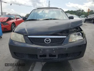 2002 Mazda Protege DX z VIN JM1BJ225020537013, wystawiony jako Copart lot #56952495 z przebiegiem 129 846 mil mil oraz Czysty tytuł • Clean title. Historia ofert i sprzedaży dostępna na DreamBid. Obrazek 5.