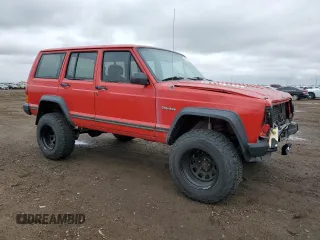 1996 Jeep Cherokee SE z VIN 1J4FJ28S3TL176627, wystawiony jako Copart lot #48173785 z przebiegiem 310 444 mil mil oraz Szkoda całkowita • Salvage title. Historia ofert i sprzedaży dostępna na DreamBid. Obrazek 4.