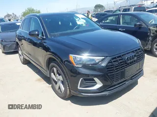 2019 Audi Q3 Premium with VIN WA1AECF33K1086047, listed as a IAAI auction lot 41905218 with 51,802 mi miles. Bid and sale history available at carsss.com. Image 1.