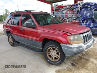 2003 Jeep Grand Cherokee Laredo z VIN 1J4GX48SX3C604630, wystawiony jako IAAI lot #42762013 z przebiegiem 202 563 mil mil oraz . Historia ofert i sprzedaży dostępna na DreamBid. Obrazek 1.