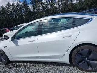 2020 Tesla Model 3 Long Range z VIN 5YJ3E1EB5LF619018, wystawiony jako IAAI lot #42131960 z przebiegiem 29 774 mil mil oraz . Historia ofert i sprzedaży dostępna na DreamBid. Obrazek 14.