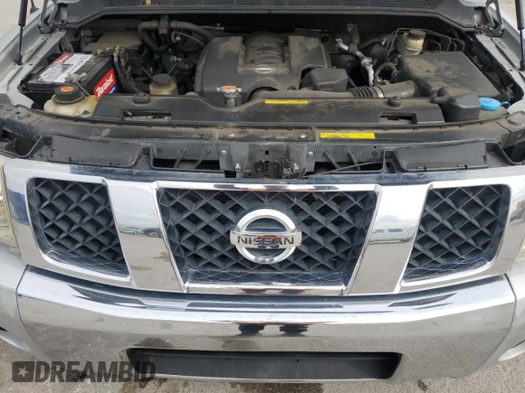 2006 Nissan Titan SE с VIN 1N6BA06A16N571799, выставлен на аукционе Copart как лот 46093745 с пробегом 118 019 миль миль и Списание • Salvage title. История ставок и продаж доступна на DreamBid. Изображение 11.