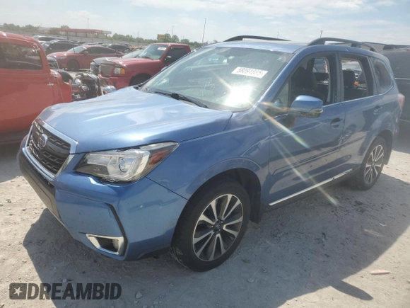 2017 Subaru Forester Touring with VIN JF2SJGTC2HH404923, listed as a Copart auction lot 58091885 with 101,317 mi miles and Salvage title. Bid and sale history available at DreamBid. Image 1.
