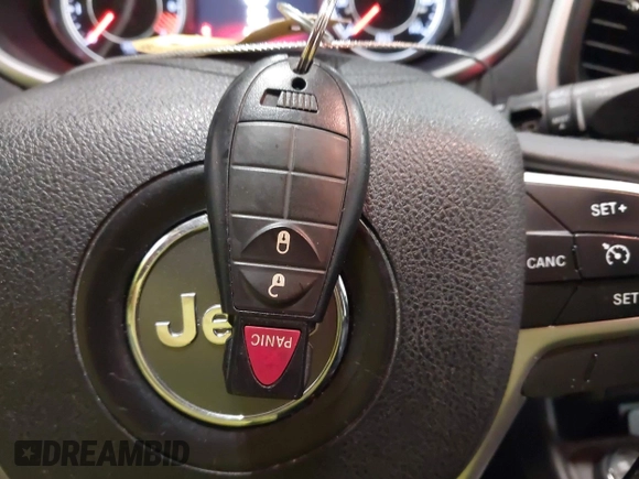 2015 Jeep Cherokee Trailhawk with VIN 1C4PJMBB4FW528633, listed as a IAAI auction lot 42147632 with 166,669 mi miles and . Bid and sale history available at DreamBid. Image 11.