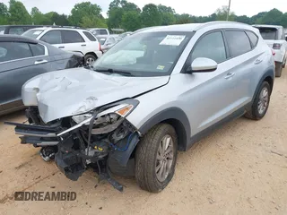 2016 Hyundai Tucson SE z VIN KM8J33A48GU116852, wystawiony jako IAAI lot #42111656 z przebiegiem 138 656 mil mil oraz . Historia ofert i sprzedaży dostępna na DreamBid. Obrazek 17.