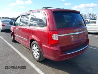 2012 Chrysler Town & Country Touring-L with VIN 2C4RC1CG3CR413148, listed as a IAAI auction lot 42040272 with 137,631 mi miles. Bid and sale history available at carsss.com. Image 3.