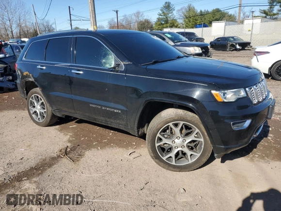 2019 Jeep Grand Cherokee Overland with VIN 1C4RJFCG9KC569575, listed as a Copart auction lot 48952875 with 87,053 mi miles and Salvage Title. Bid and sale history available at carsss.com. Image 4.