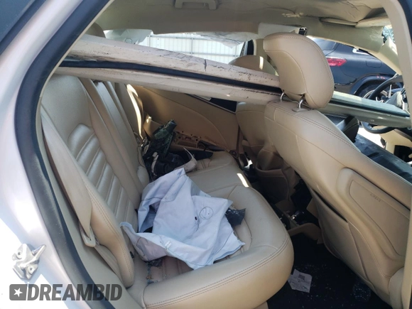 2015 Ford Fusion SE Hybrid z VIN 3FA6P0LU8FR105615, wystawiony jako Copart lot #61451155 z przebiegiem 106 778 mil mil oraz Szkoda całkowita • Salvage title. Historia ofert i sprzedaży dostępna na DreamBid. Obrazek 10.