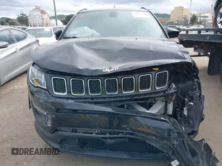 2018 Jeep Compass Altitude with VIN 3C4NJDBB0JT484409, listed as a IAAI auction lot 41656179 with 85,436 mi miles and . Bid and sale history available at carsss.com. Image 12.