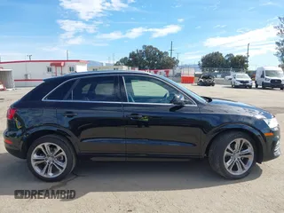2017 Audi Q3 Premium Plus z VIN WA1HCCFS7HR001054, wystawiony jako IAAI lot #41583344 z przebiegiem 79 330 mil mil oraz . Historia ofert i sprzedaży dostępna na DreamBid. Obrazek 13.