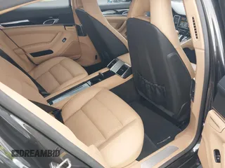 2015 Porsche Panamera 4 с VIN WP0AA2A71FL002436, выставлен на аукционе IAAI как лот 42479904 с пробегом 64 750 миль миль и . История ставок и продаж доступна на DreamBid. Изображение 8.