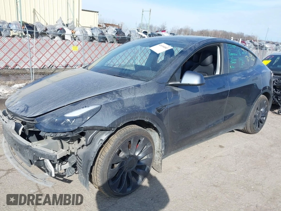 2023 Tesla Model Y Performance with VIN 7SAYGDEF7PF590750, listed as a IAAI auction lot 41694002 with Not Provided miles and . Bid and sale history available at DreamBid. Image 2.