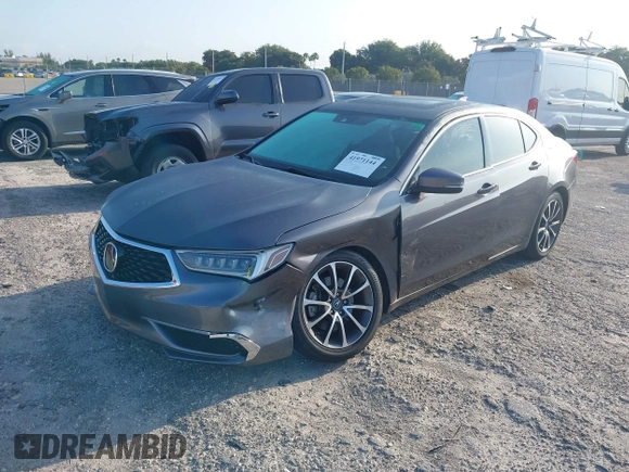2019 Acura TLX with VIN 19UUB2F39KA004586, listed as a IAAI auction lot 41971144 with 61,081 mi miles and . Bid and sale history available at DreamBid. Image 2.