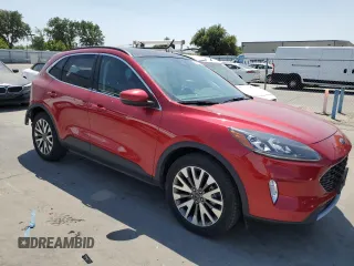 2020 Ford Escape Titanium with VIN 1FMCU9J98LUA58109, listed as a Copart auction lot 59397735 with 31,334 mi miles and Salvage title. Bid and sale history available at DreamBid. Image 4.