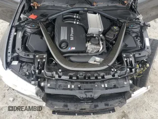 2015 BMW M4 z VIN WBS3U9C5XFP968001, wystawiony jako Copart lot #85566764 z przebiegiem 26 927 mil mil oraz Szkoda całkowita • Salvage title. Historia ofert i sprzedaży dostępna na DreamBid. Obrazek 11.