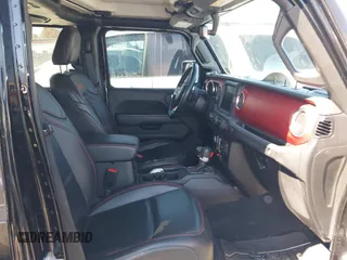 2019 Jeep Wrangler Unlimited Rubicon with VIN 1C4HJXFN1KW679028, listed as a IAAI auction lot 41654887 with 32,247 mi miles and . Bid and sale history available at DreamBid. Image 5.