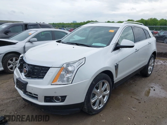 2014 Cadillac SRX Performance Collection with VIN 3GYFNCE34ES519059, listed as a IAAI auction lot 42237351 with 80,578 mi miles and . Bid and sale history available at DreamBid. Image 2.