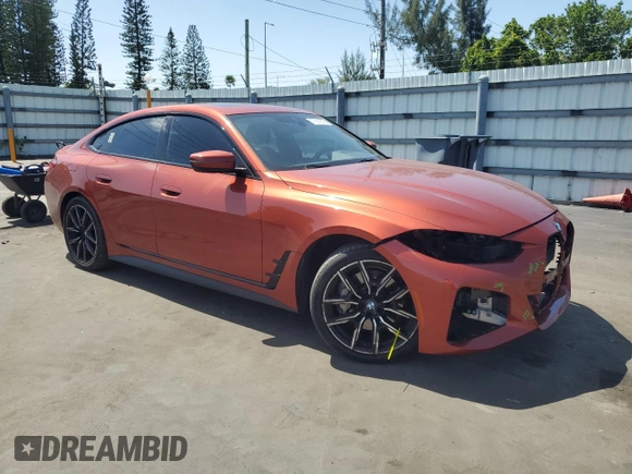 2022 BMW 4 Series 430i with VIN WBA63AV06NFM11260, listed as a Copart auction lot 57551825 with 52,969 mi miles and Salvage title. Bid and sale history available at DreamBid. Image 4.
