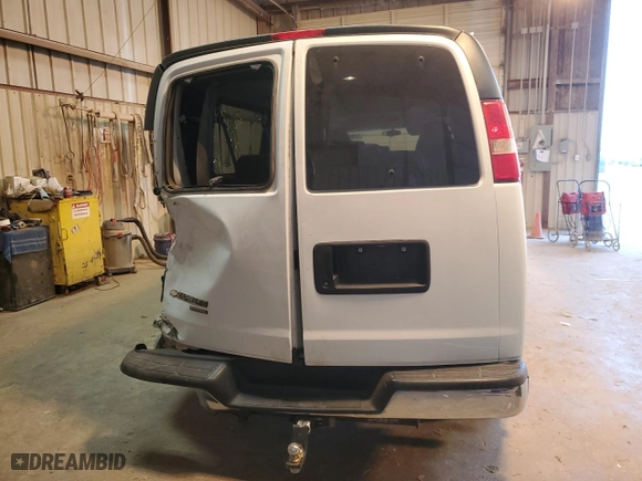 2014 Chevrolet Express Passenger LT with VIN 1GAZG1FG6E1126290, listed as a Copart auction lot 76689113 with 120,518 mi miles and Salvage Title. Bid and sale history available at carsss.com. Image 6.