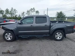 2014 Toyota Tacoma with VIN 5TFLU4EN9EX099414, listed as a IAAI auction lot 40528514 with 122,827 mi miles. Bid and sale history available at carsss.com. Image 13.