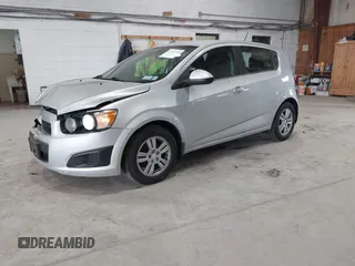 2016 Chevrolet Sonic LT z VIN 1G1JC6SG9G4151259, wystawiony jako IAAI lot #42341705 z przebiegiem 131 981 mil mil oraz . Historia ofert i sprzedaży dostępna na DreamBid. Obrazek 17.