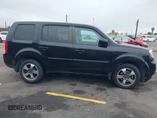 2015 Honda Pilot SE z VIN 5FNYF3H39FB013616, wystawiony jako IAAI lot #42077898 z przebiegiem 87 319 mil mil oraz . Historia ofert i sprzedaży dostępna na DreamBid. Obrazek 13.