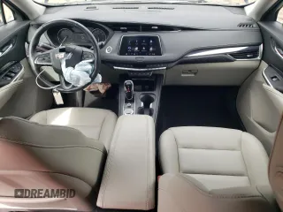2021 Cadillac XT4 AWD Luxury with VIN 1GYFZBR41MF003522, listed as a Copart auction lot 69144164 with 17,953 mi miles and Salvage Title. Bid and sale history available at carsss.com. Image 8.
