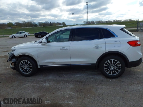 2016 Lincoln MKX Select with VIN 2LMTJ6KR3GBL61112, listed as a IAAI auction lot 42031424 with 130,321 mi miles. Bid and sale history available at carsss.com. Image 14.