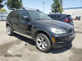 2012 BMW X5 35i z VIN 5UXZV4C51CL744313, wystawiony jako Copart lot #58270755 z przebiegiem 97 903 mil mil oraz Szkoda całkowita • Salvage title. Historia ofert i sprzedaży dostępna na DreamBid. Obrazek 4.