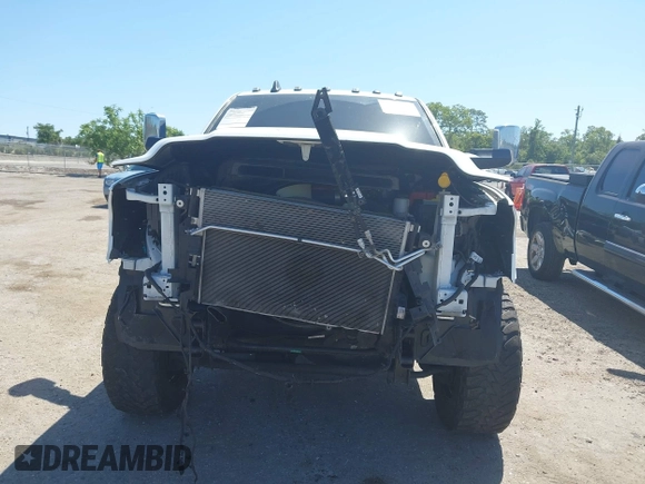 2019 Ram 2500 Laramie z VIN 3C6UR5NL2KG718789, wystawiony jako IAAI lot #42046325 z przebiegiem 54 965 mil mil oraz . Historia ofert i sprzedaży dostępna na DreamBid. Obrazek 6.
