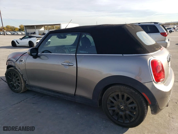 2016 MINI Cooper Convertible with VIN WMWWG5C54G3C19613, listed as a Copart auction lot 83847664 with 99,243 mi miles and Salvage Title. Bid and sale history available at carsss.com. Image 2.