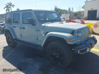 2023 Jeep Wrangler 4xe Sahara with VIN 1C4JJXP66PW627264, listed as a IAAI auction lot 41844689 with 39,137 mi miles. Bid and sale history available at carsss.com. Image 1.