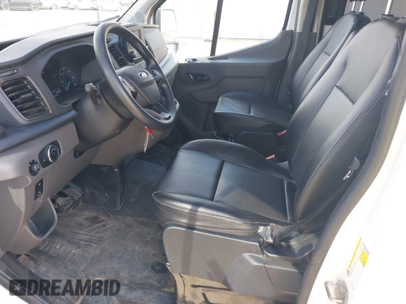 2023 Ford Transit Cargo with VIN 1FTBR1X81PKB46146, listed as a IAAI auction lot 42180262 with 75,169 mi miles and . Bid and sale history available at DreamBid. Image 22.
