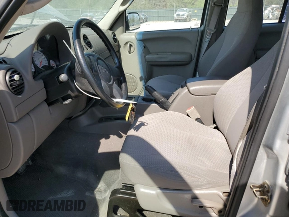 2003 Jeep Liberty Sport with VIN 1J4GK48K73W725175, listed as a Copart auction lot 53801155 with 104,727 mi miles and Salvage Title. Bid and sale history available at DreamBid. Image 7.