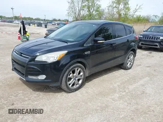 2013 Ford Escape SEL with VIN 1FMCU9H92DUA45282, listed as a IAAI auction lot 42184946 with 96,512 mi miles and . Bid and sale history available at DreamBid. Image 2.