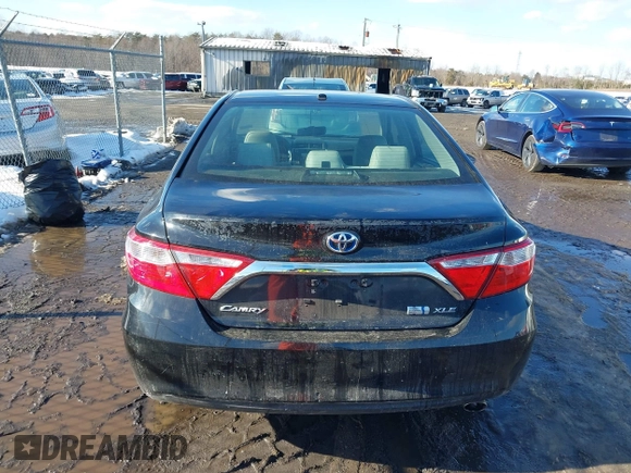2017 Toyota Camry Hybrid LE with VIN 4T1BD1FK9HU203089, listed as a IAAI auction lot 41315779 with 87,630 mi miles. Bid and sale history available at carsss.com. Image 16.