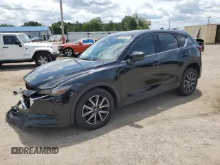 2018 Mazda CX-5 Grand Touring with VIN JM3KFBDM0J0362967, listed as a Copart auction lot 60288665 with 137,241 mi miles and Salvage title. Bid and sale history available at DreamBid. Image 1.