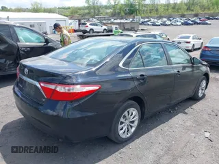 2015 Toyota Camry XLE with VIN 4T4BF1FK5FR491688, listed as a IAAI auction lot 42189497 with 135,126 mi miles and . Bid and sale history available at DreamBid. Image 4.