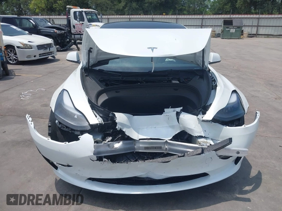 2023 Tesla Model 3 z VIN 5YJ3E1EA3PF604076, wystawiony jako IAAI lot #42181964 z przebiegiem 23 207 mil mil oraz . Historia ofert i sprzedaży dostępna na DreamBid. Obrazek 6.