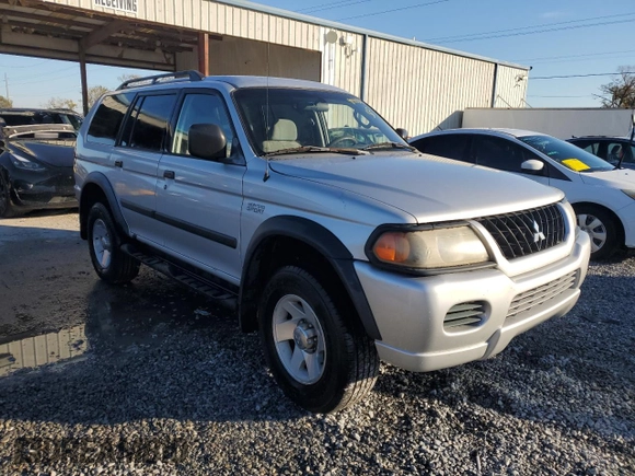 2003 Mitsubishi Montero ES z VIN JA4LS21H13J005577, wystawiony jako Copart lot #41415375 z przebiegiem 171 037 mil mil oraz Szkoda całkowita • Salvage title. Historia ofert i sprzedaży dostępna na DreamBid. Obrazek 4.