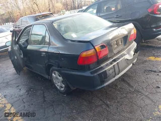 1999 Honda Civic EX with VIN 1HGEJ8644XL037266, listed as a IAAI auction lot 41254910 with 171,509 mi miles. Bid and sale history available at carsss.com. Image 3.