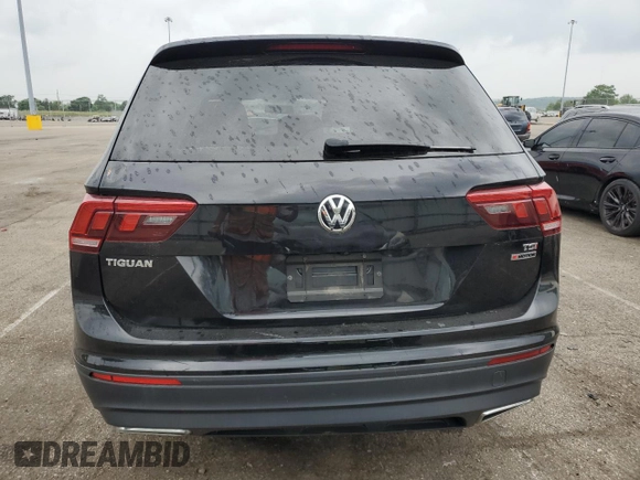 2018 Volkswagen Tiguan S with VIN 3VV0B7AX3JM055587, listed as a Copart auction lot 59751225 with 66,779 mi miles and Salvage title. Bid and sale history available at DreamBid. Image 6.